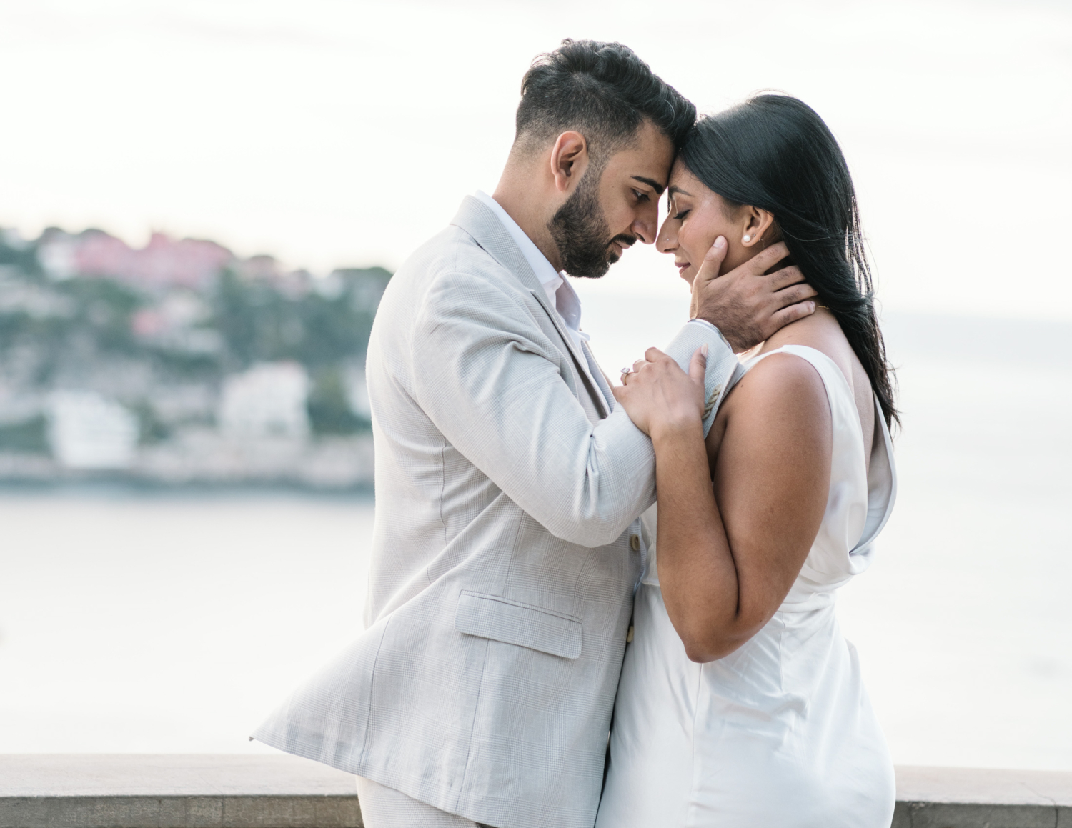 beautiful indian american couple embrace for engagement session in nice france