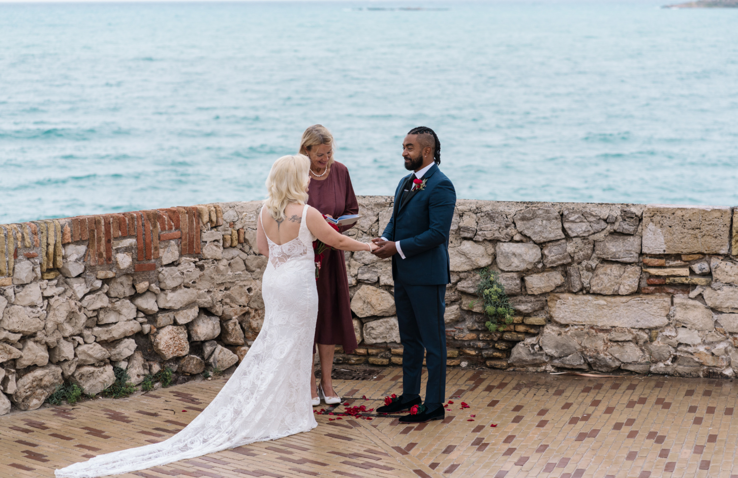 couple exchange wedding vows at elopement in antibes france