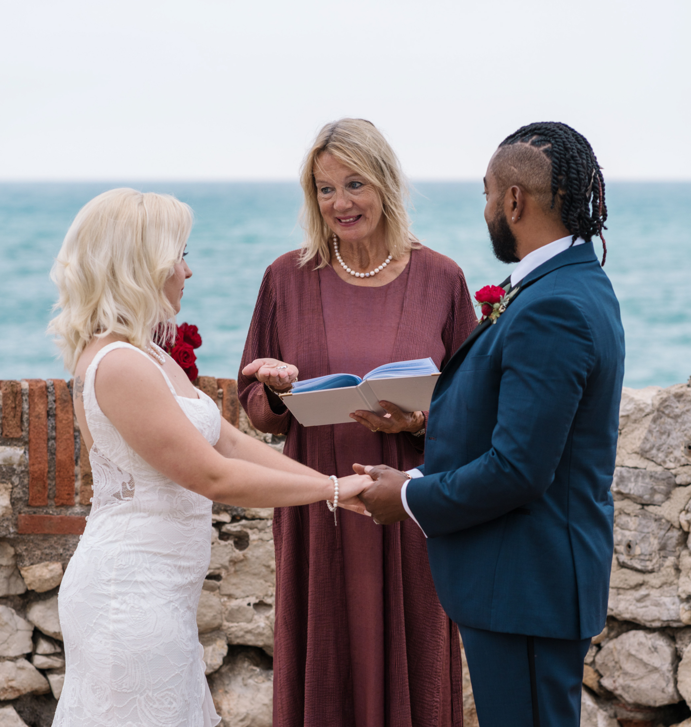 bride and groom exchange rings during elopement ceremony in antibes france