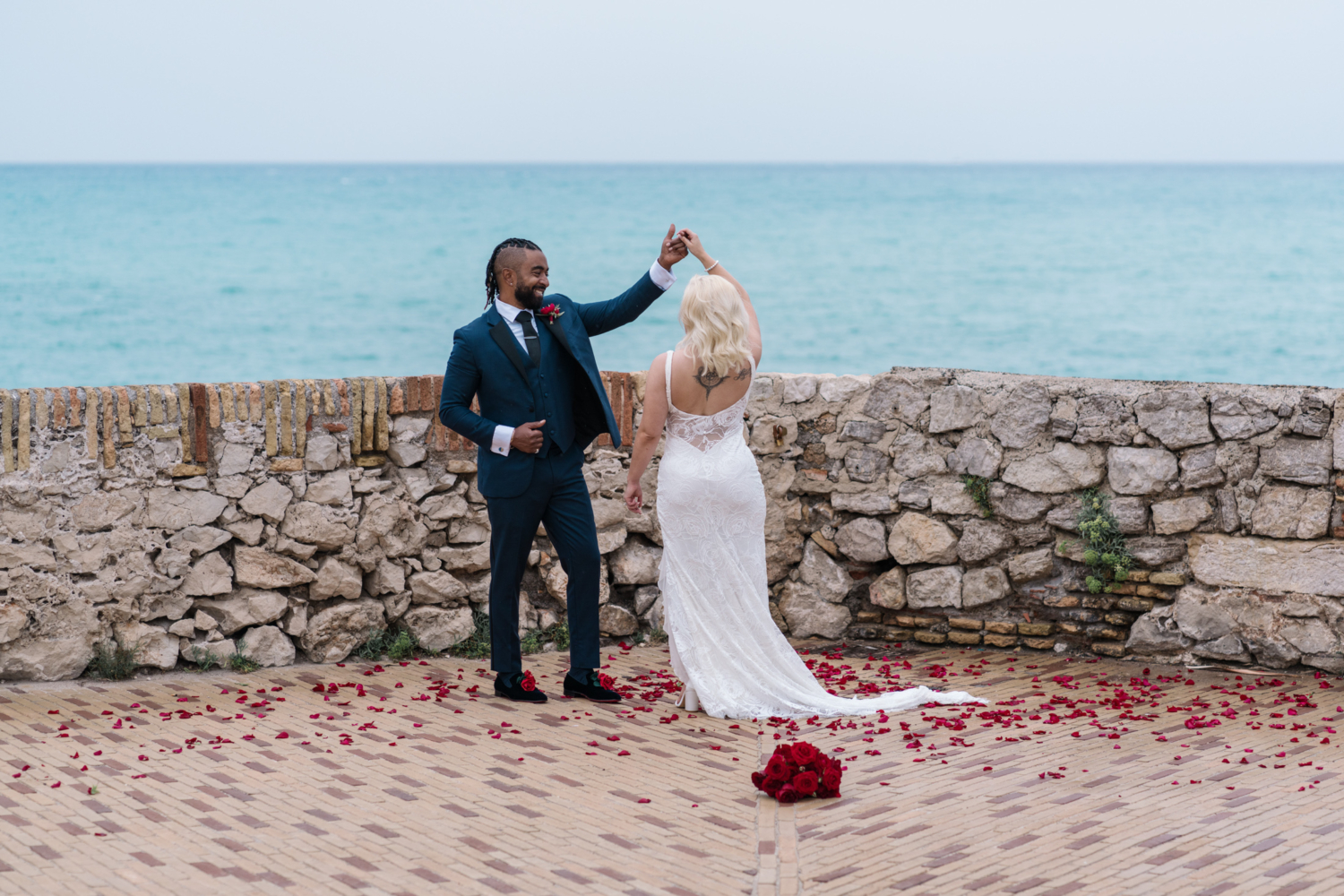 bride and groom dance with a sea view in antibes france