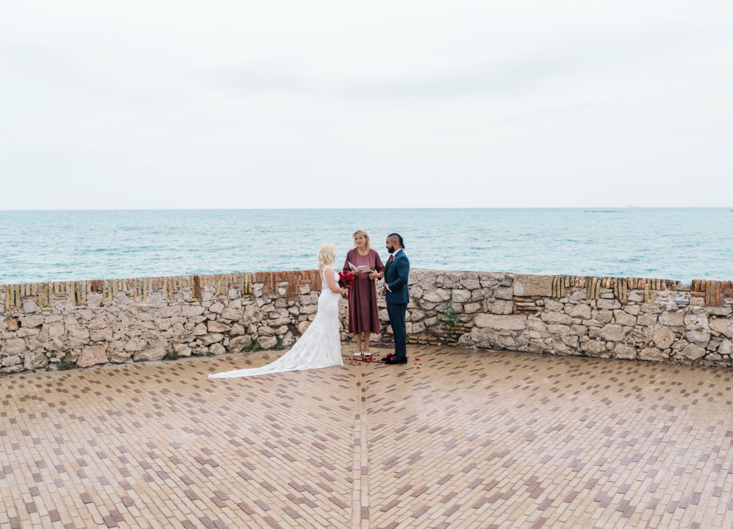 beautiful elopement ceremony at sea wall in antibes france