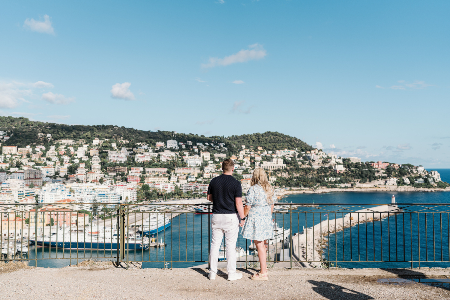 cute couple just before their surprise proposal with view of sea in nice france