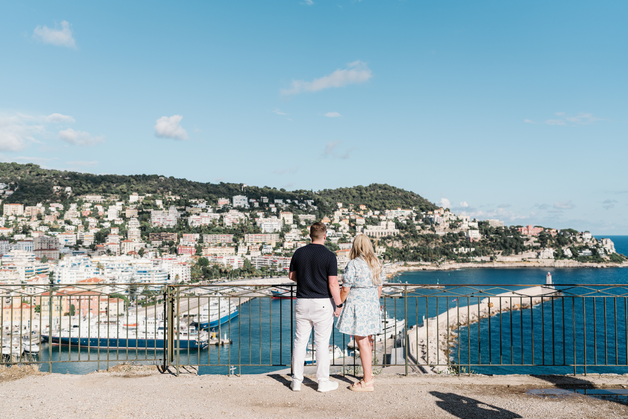 cute couple just before their surprise proposal with view of sea in nice france