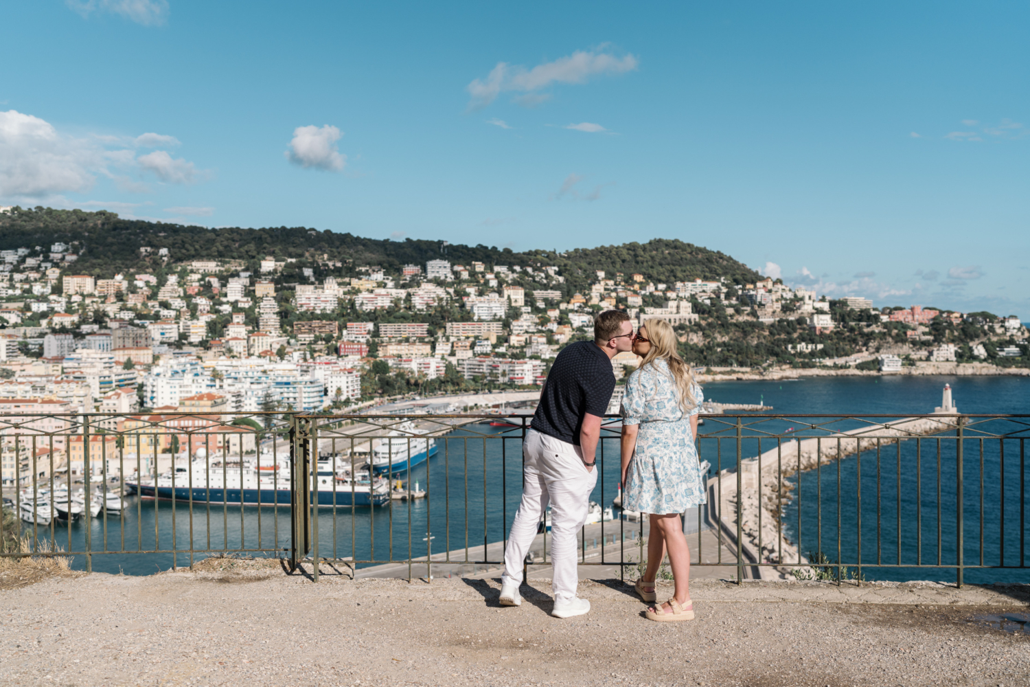 couple kiss with view of sea in nice france