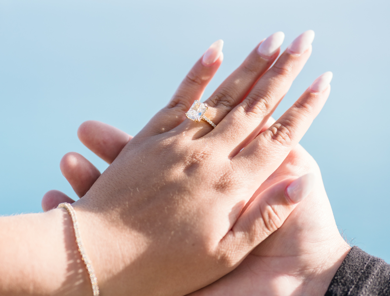 woman shows off diamond engagement ring in nice france