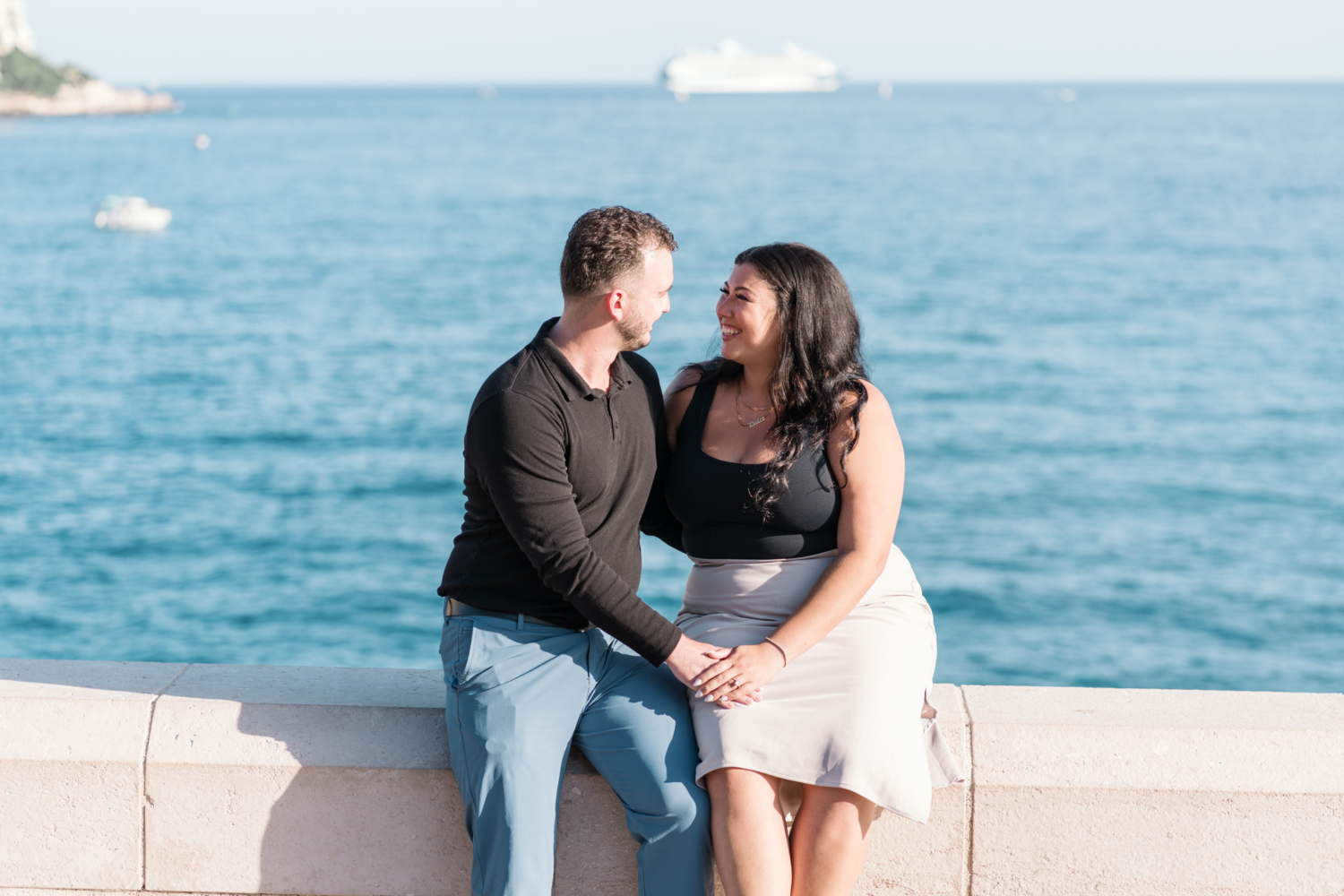 happy couple laugh and smile after their engagement in nice france