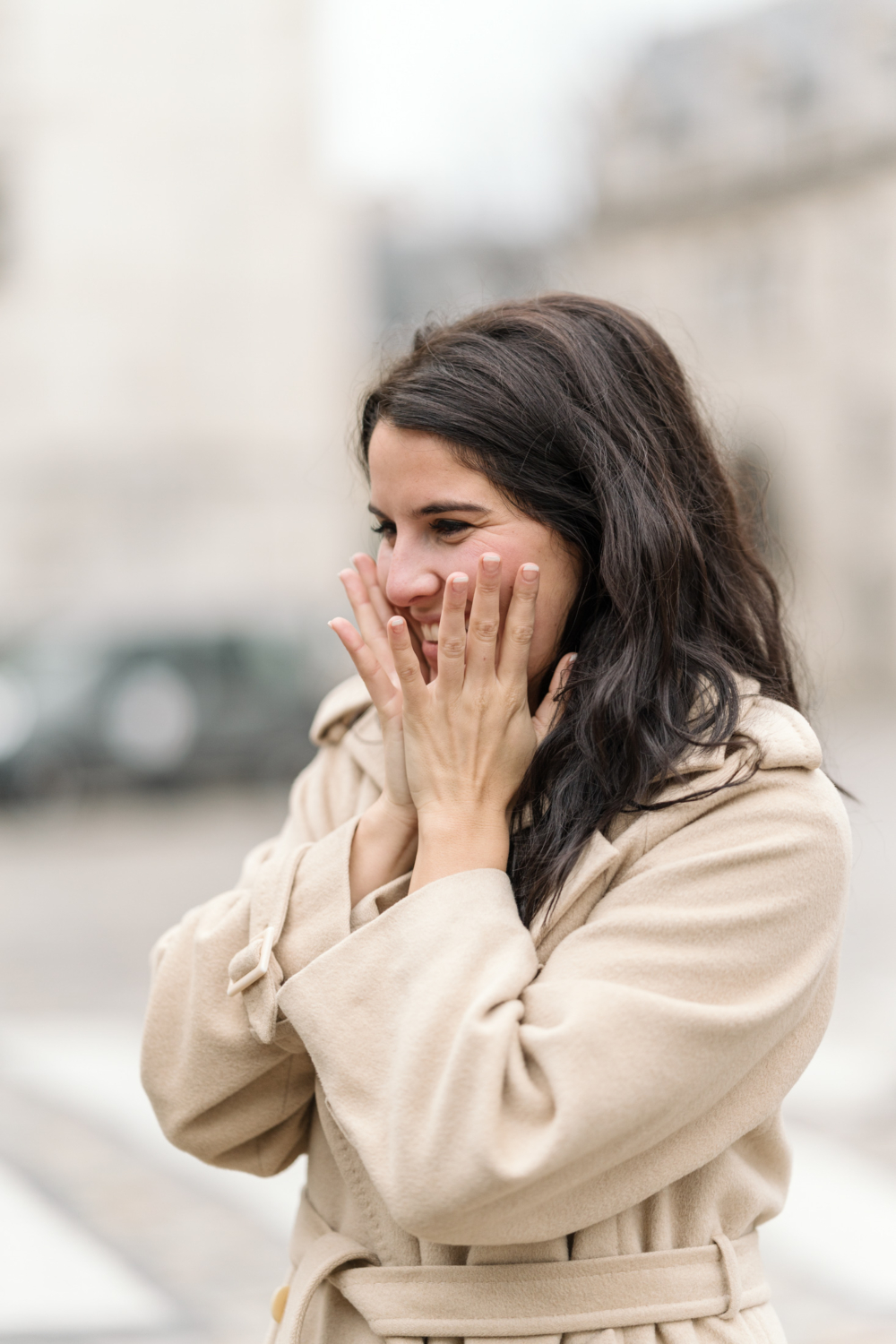 woman is surprised by proposal in paris