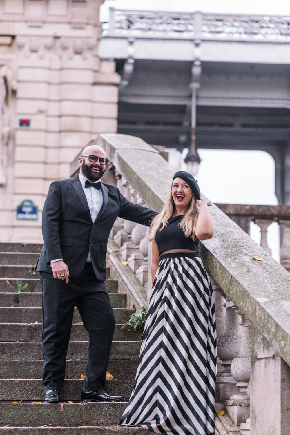 married couple laugh on their anniversary in paris