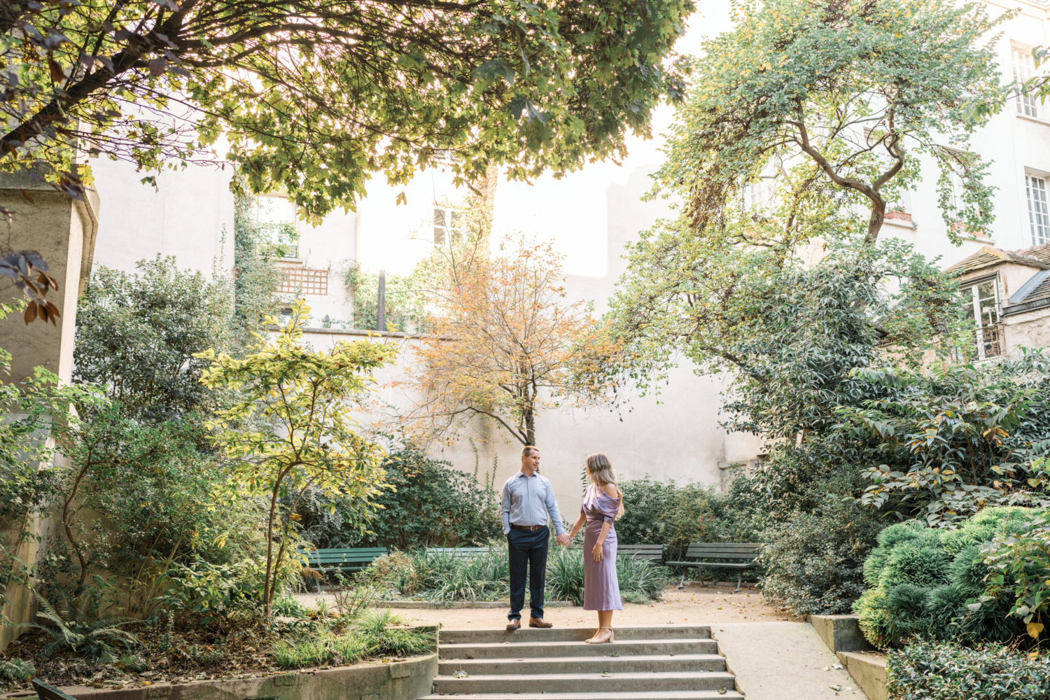 beautiful married couple celebrate anniversary in park in paris