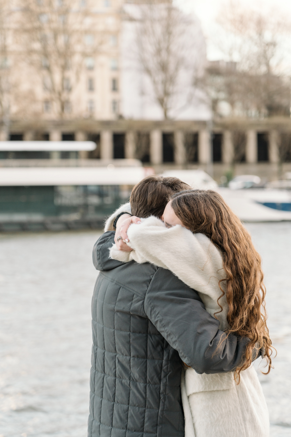 newly engaged couple hug in paris