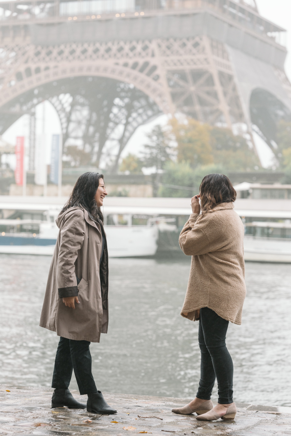 woman is surprise after proposal in paris at the eiffel tower