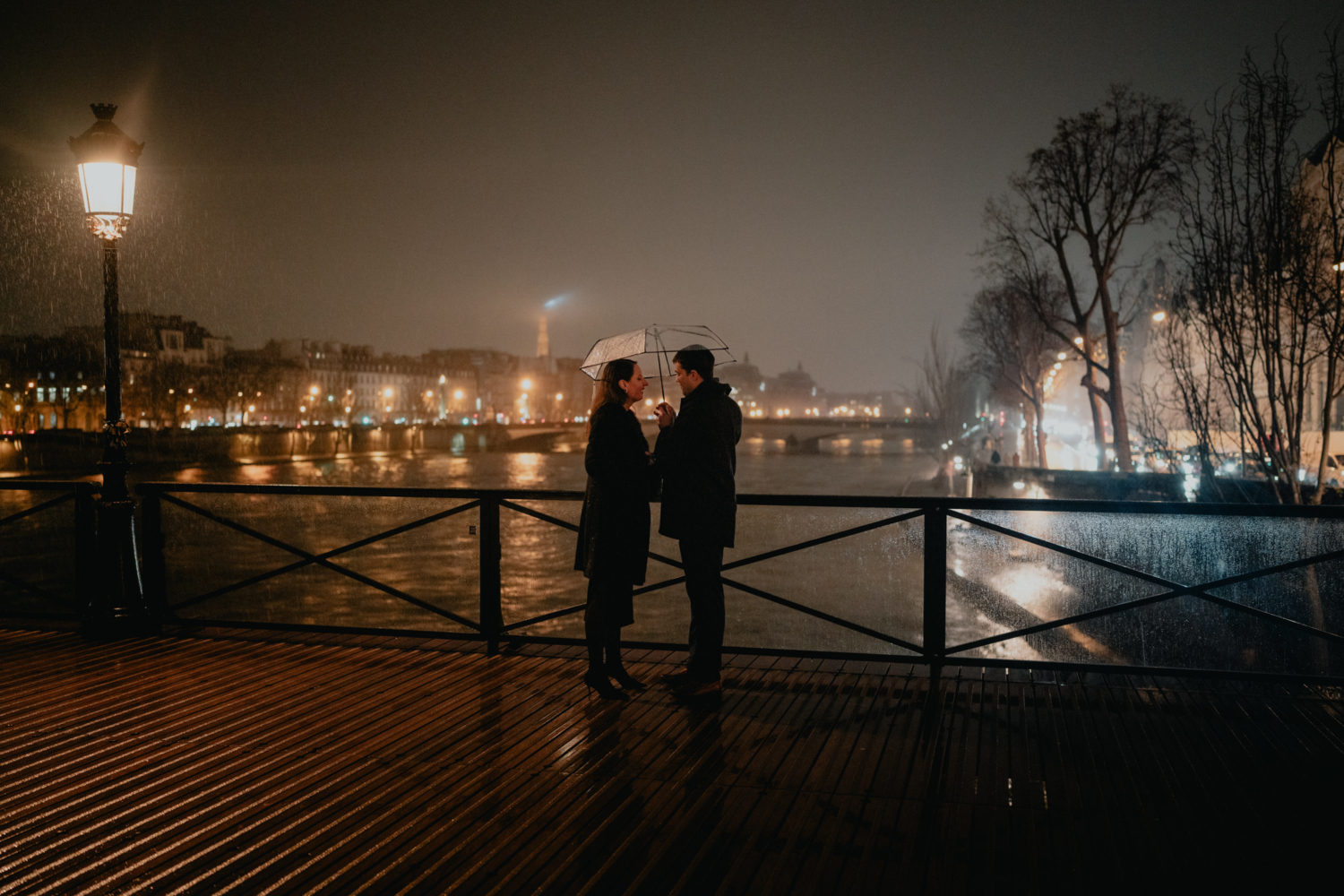 man stops to talk to woman just before he proposes in paris