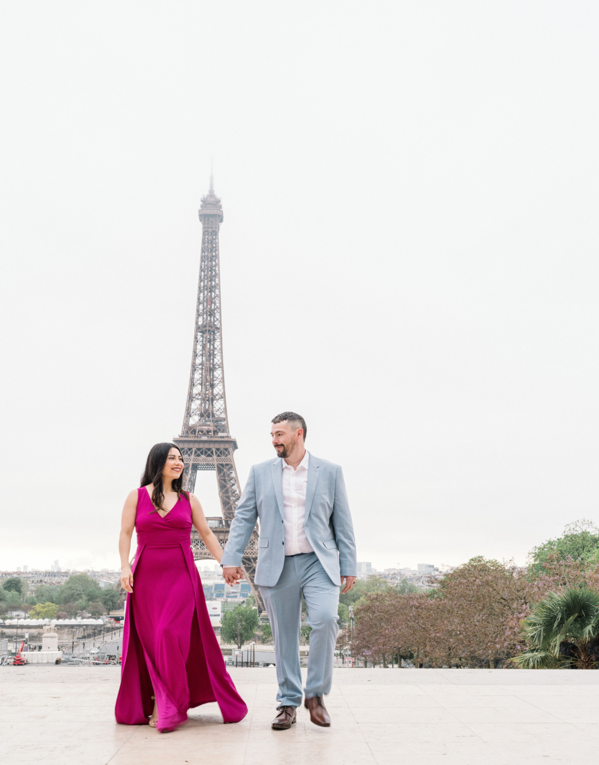 beautiful couple walk near eiffel tower in paris france