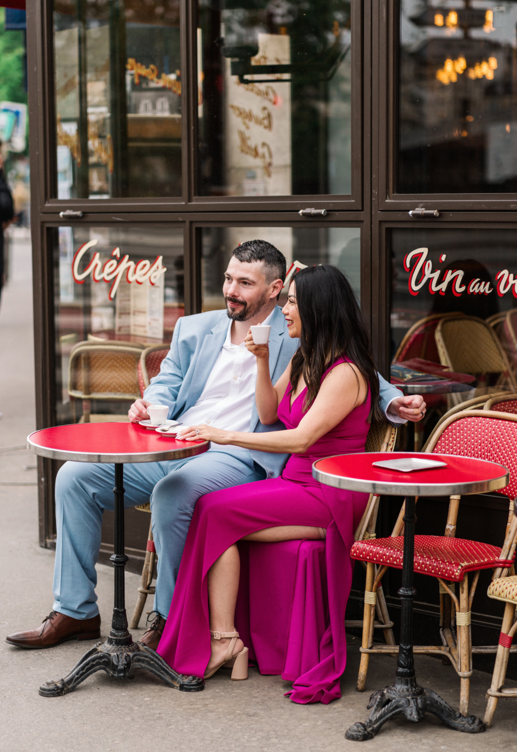 couple enjoy coffee in traditional paris cafe