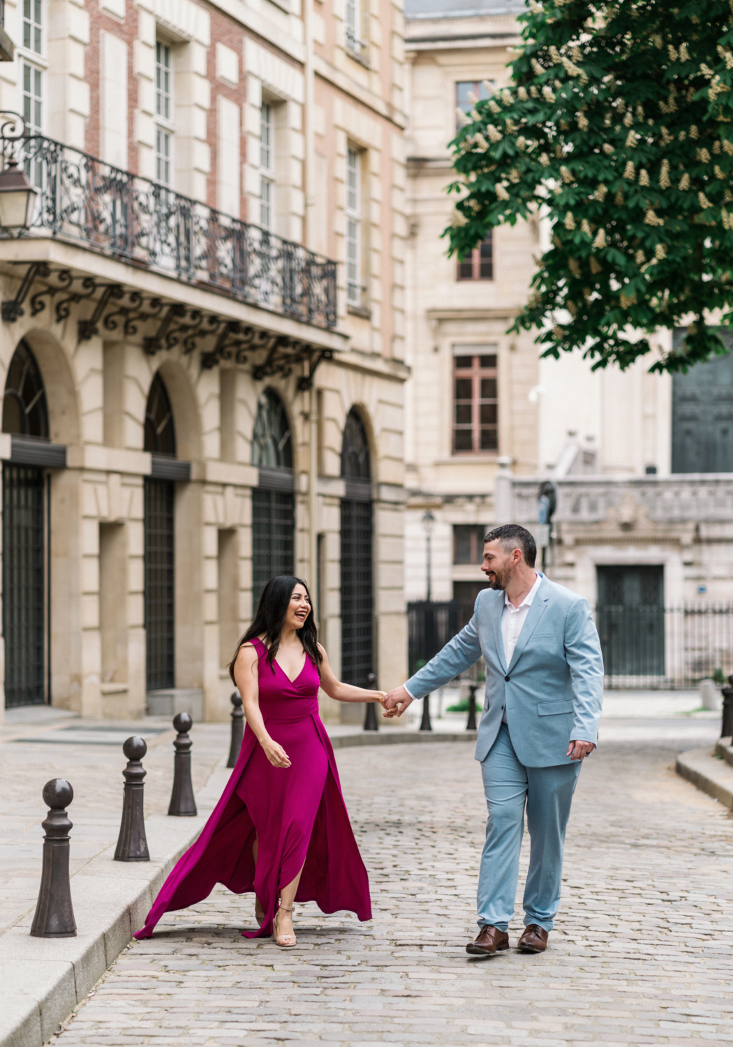 married couple laugh and walk in place dauphine paris france