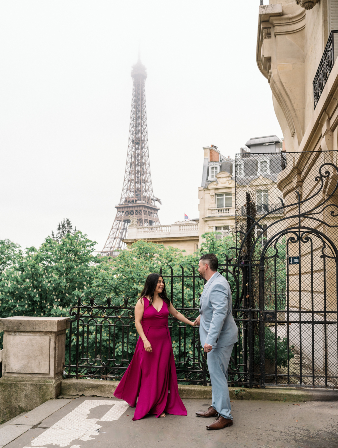 couple dance with view of eiffel tower in paris