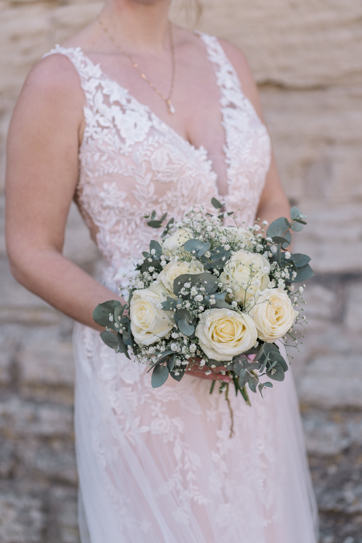 bridal bouquet with roses and baby's breath