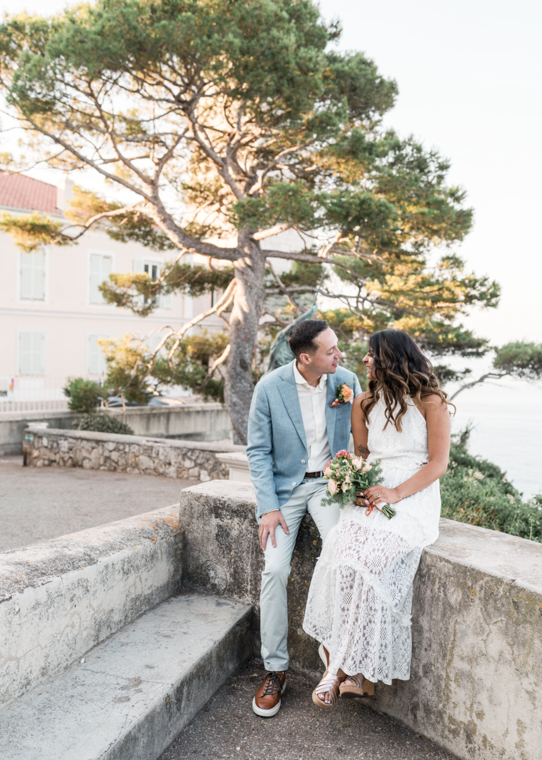 couple laugh before their elopement in saint jean cap ferrat france on the french riviera