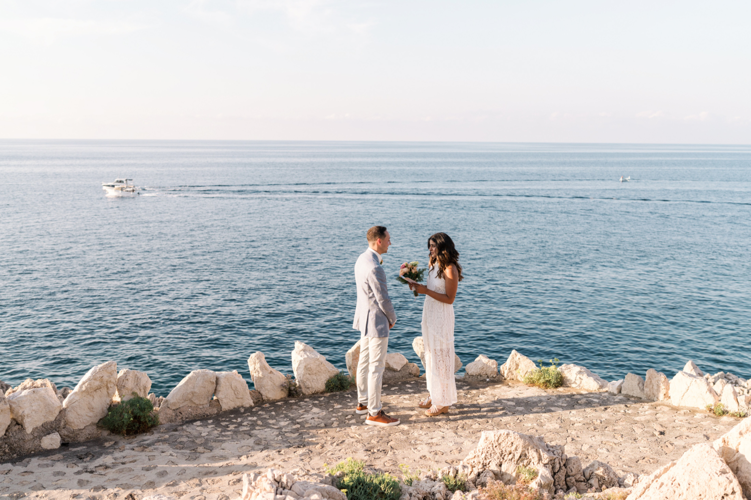 bride and groom share their vows during their elopement in saint jean cap ferrat france on the french riviera