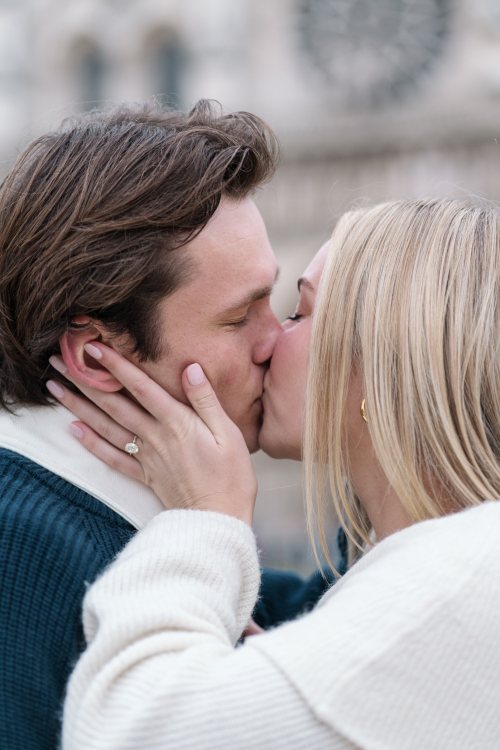 newly engaged couple kiss tenderly in paris