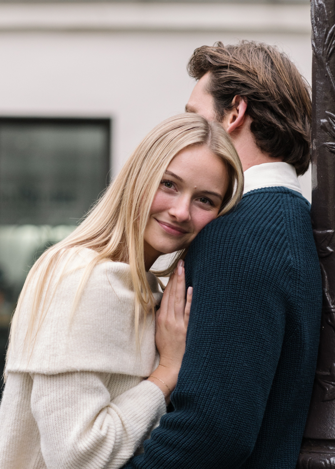 newly engaged couple embrace in paris