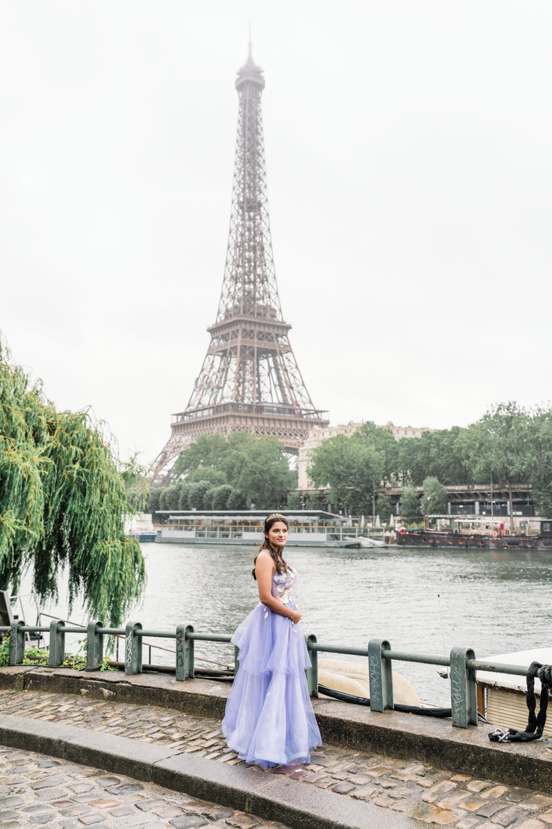 quinceanera photoshoot with view of eiffel tower