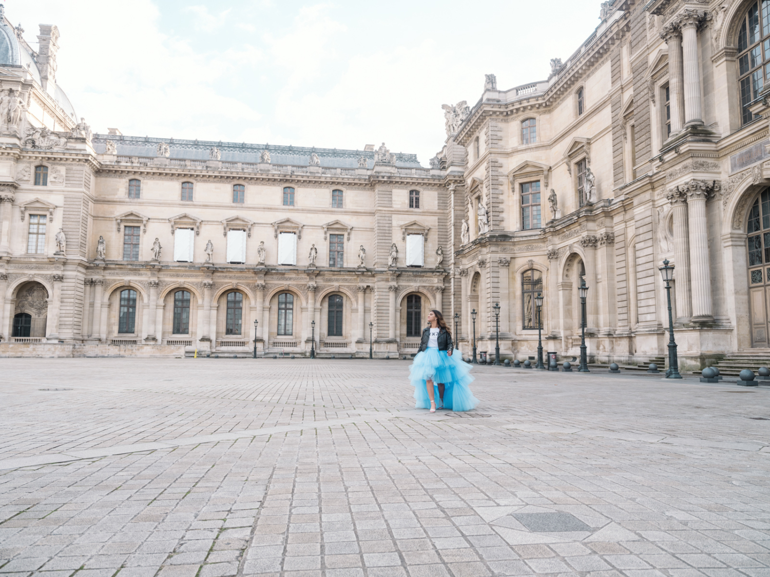 quinceanera photo shoot at the courtyard at the louvre in paris