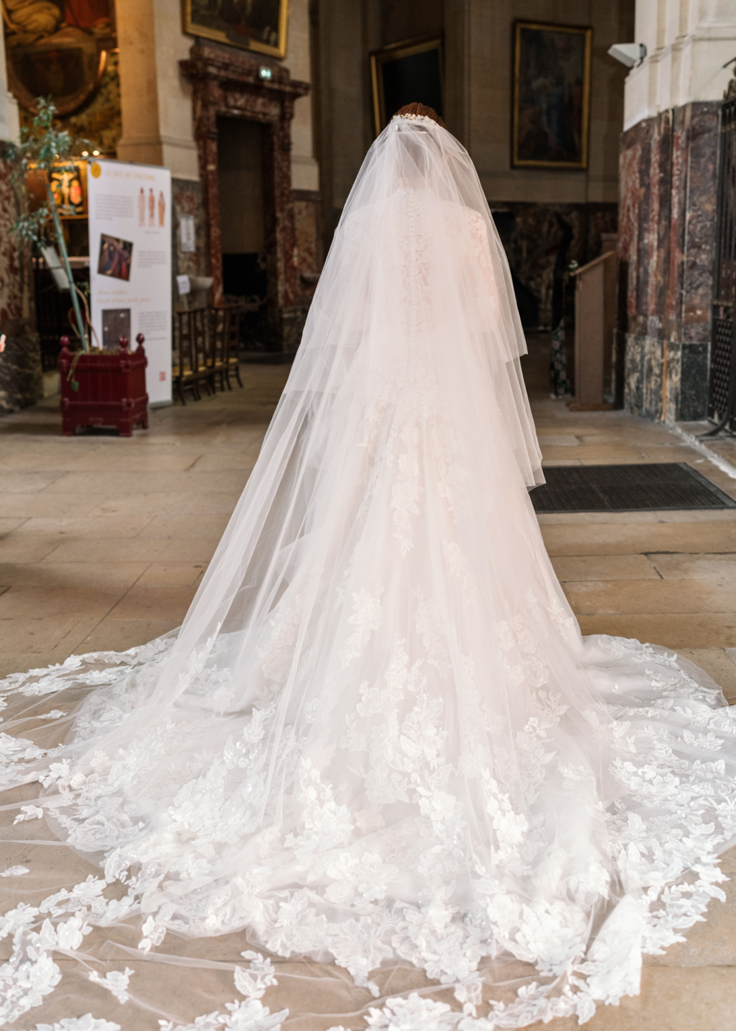 bride walks into church for her wedding in paris