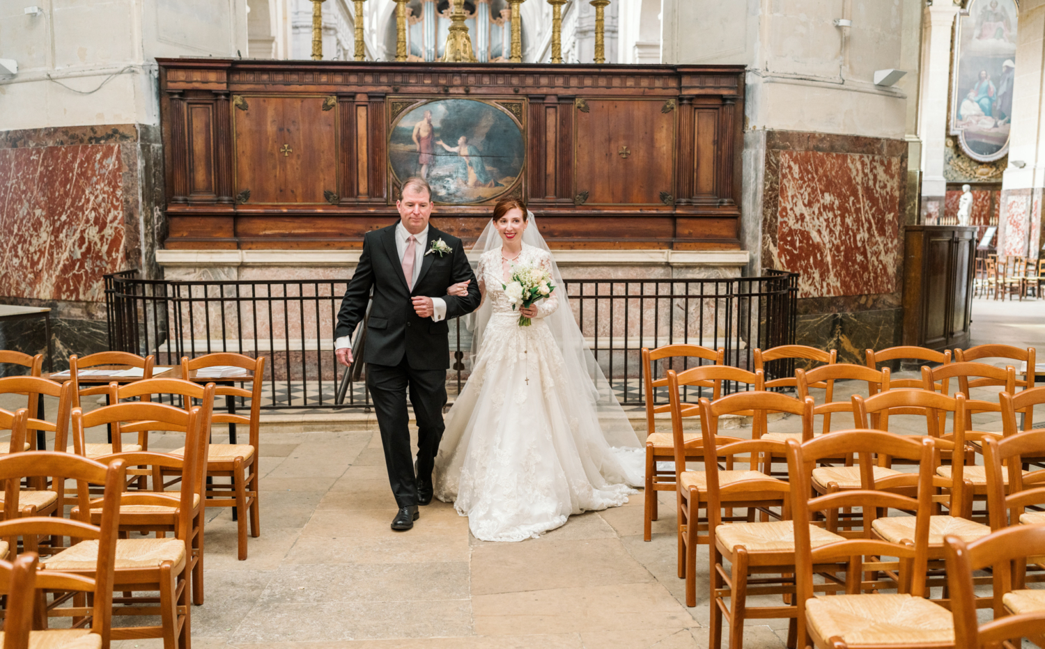 father walks bride down the aisle in paris