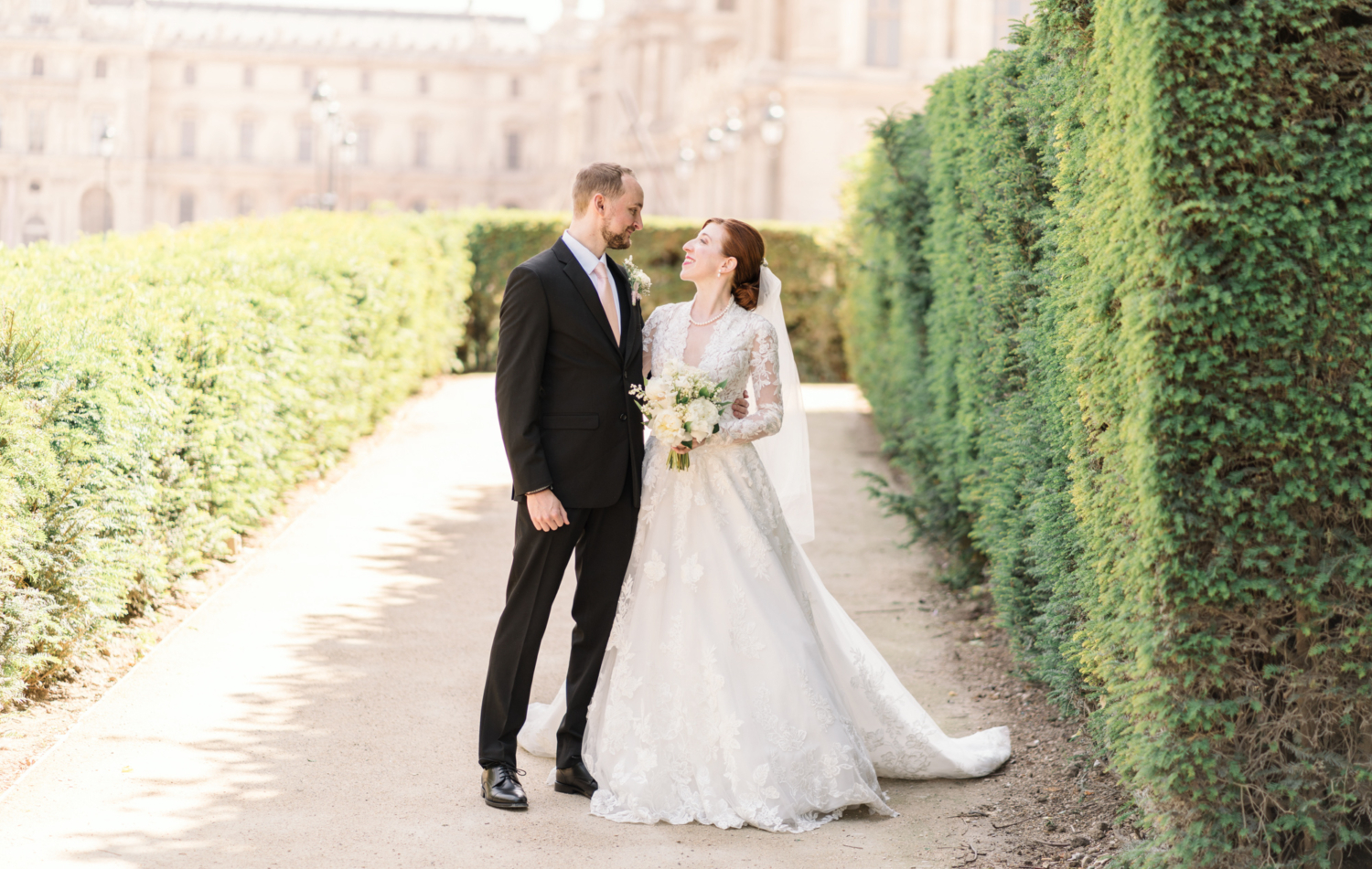 bridge and groom pose after wedding in paris