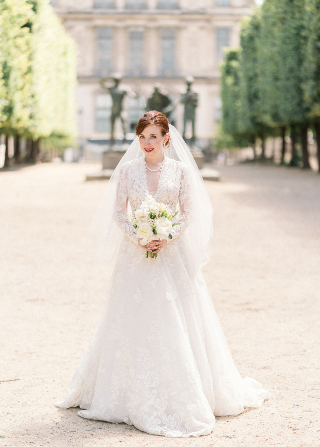 bride smiles on her wedding day in paris