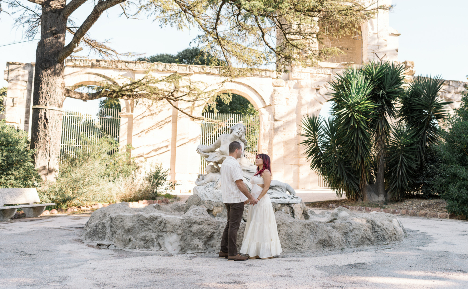 couple celebrate anniversary with view of roman theater in arles france