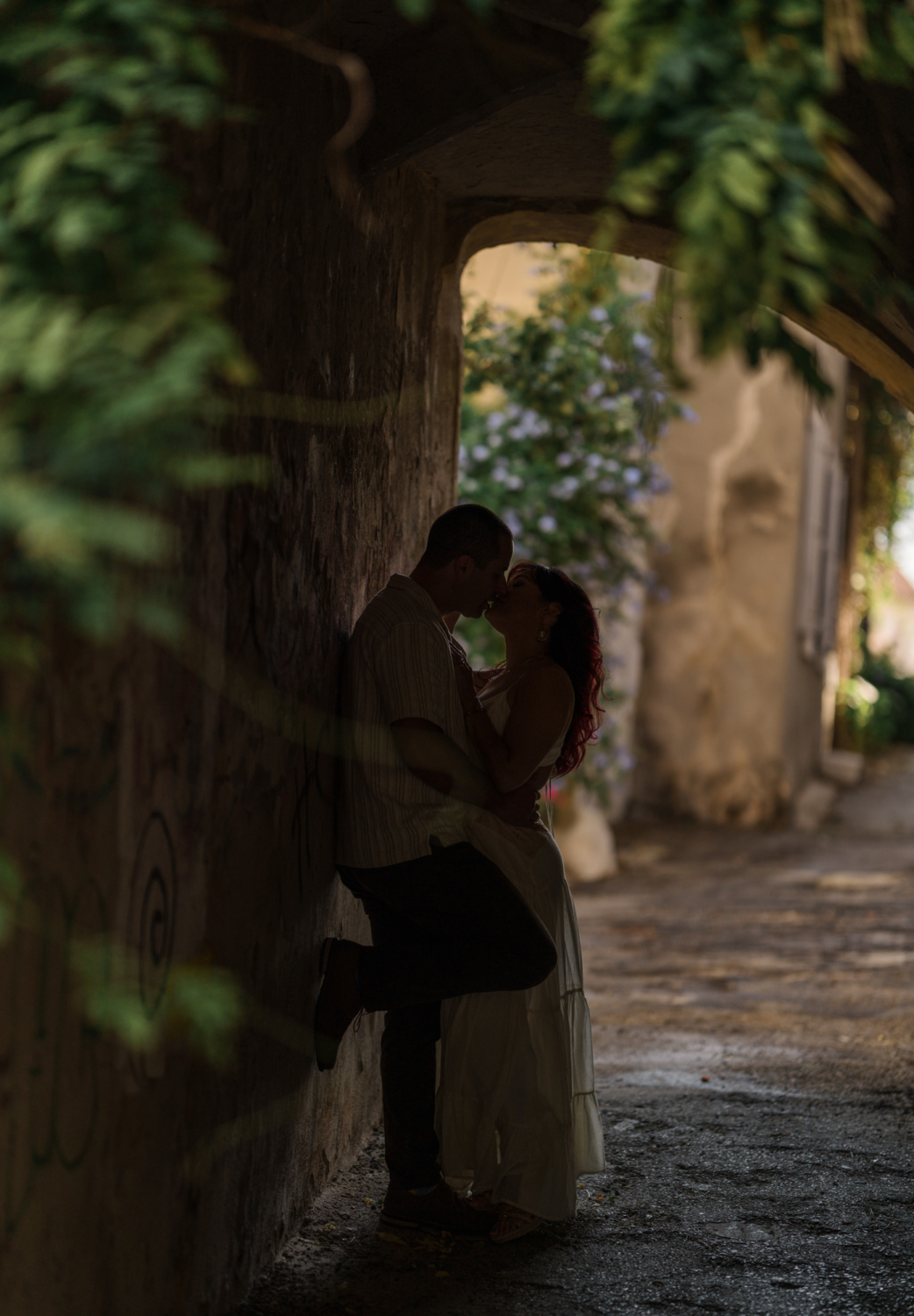 couple celebrate anniversary with passionate kiss in arles france