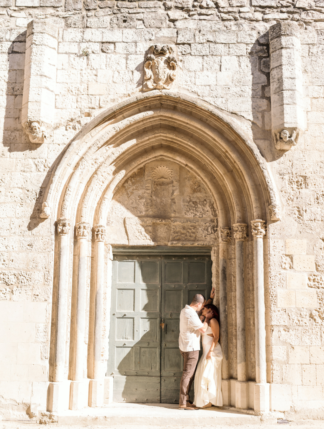 couple embrace passionately in arles france