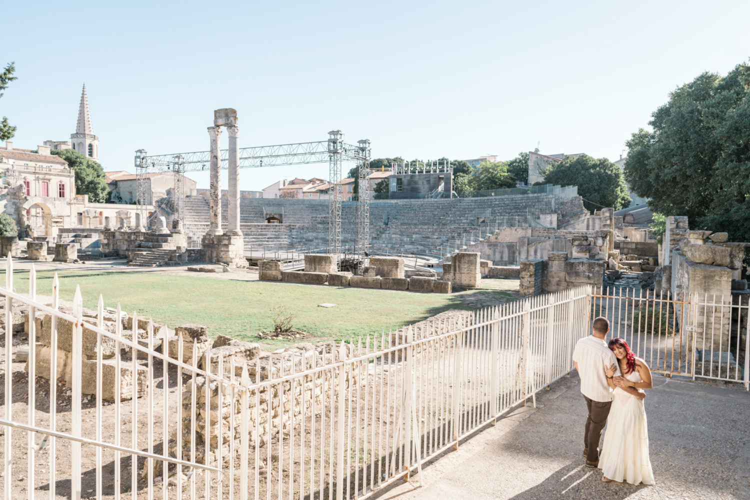 couple celebrate anniversary with view of roman theater in arles france