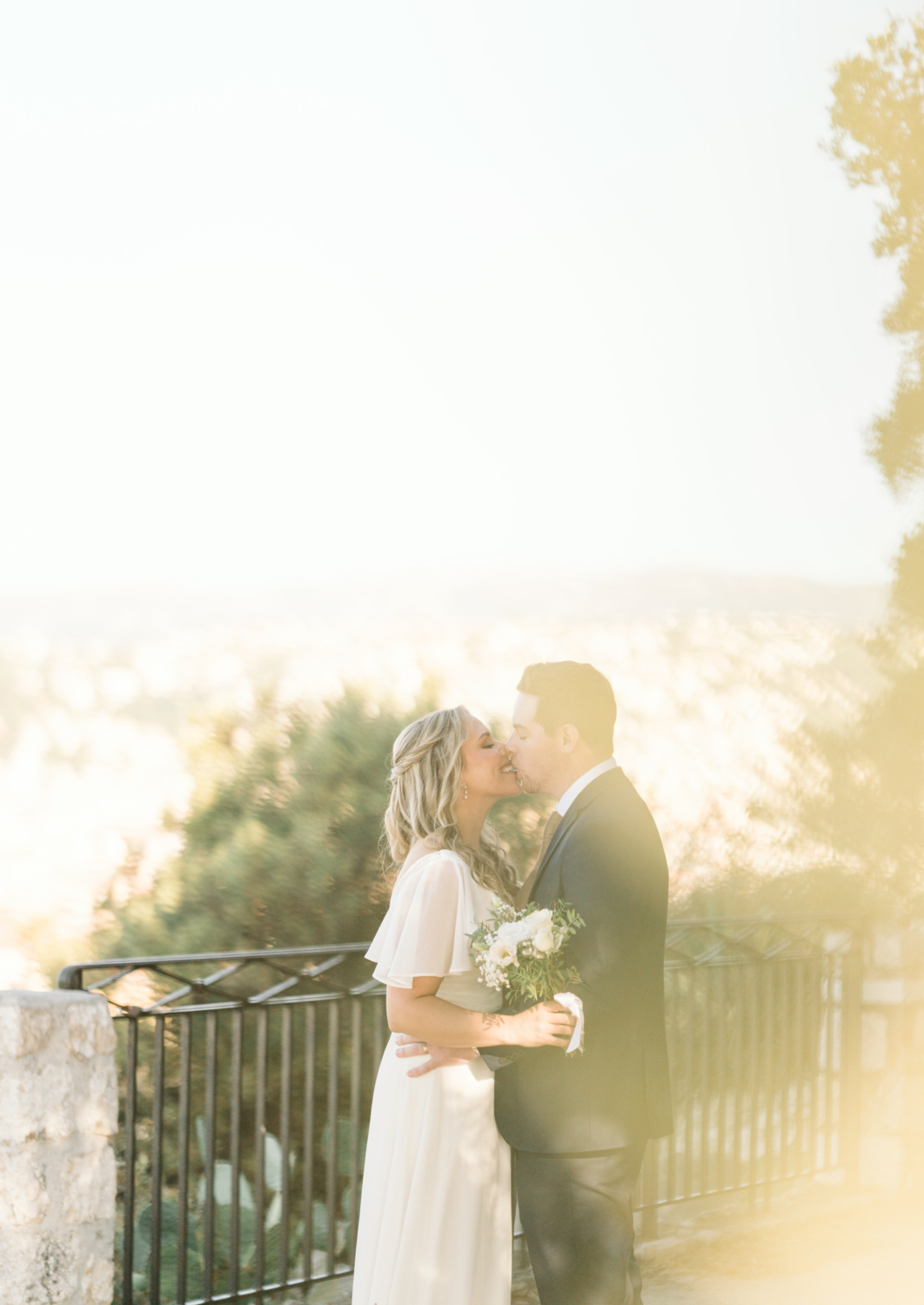 newlywed couple embrace in nice france