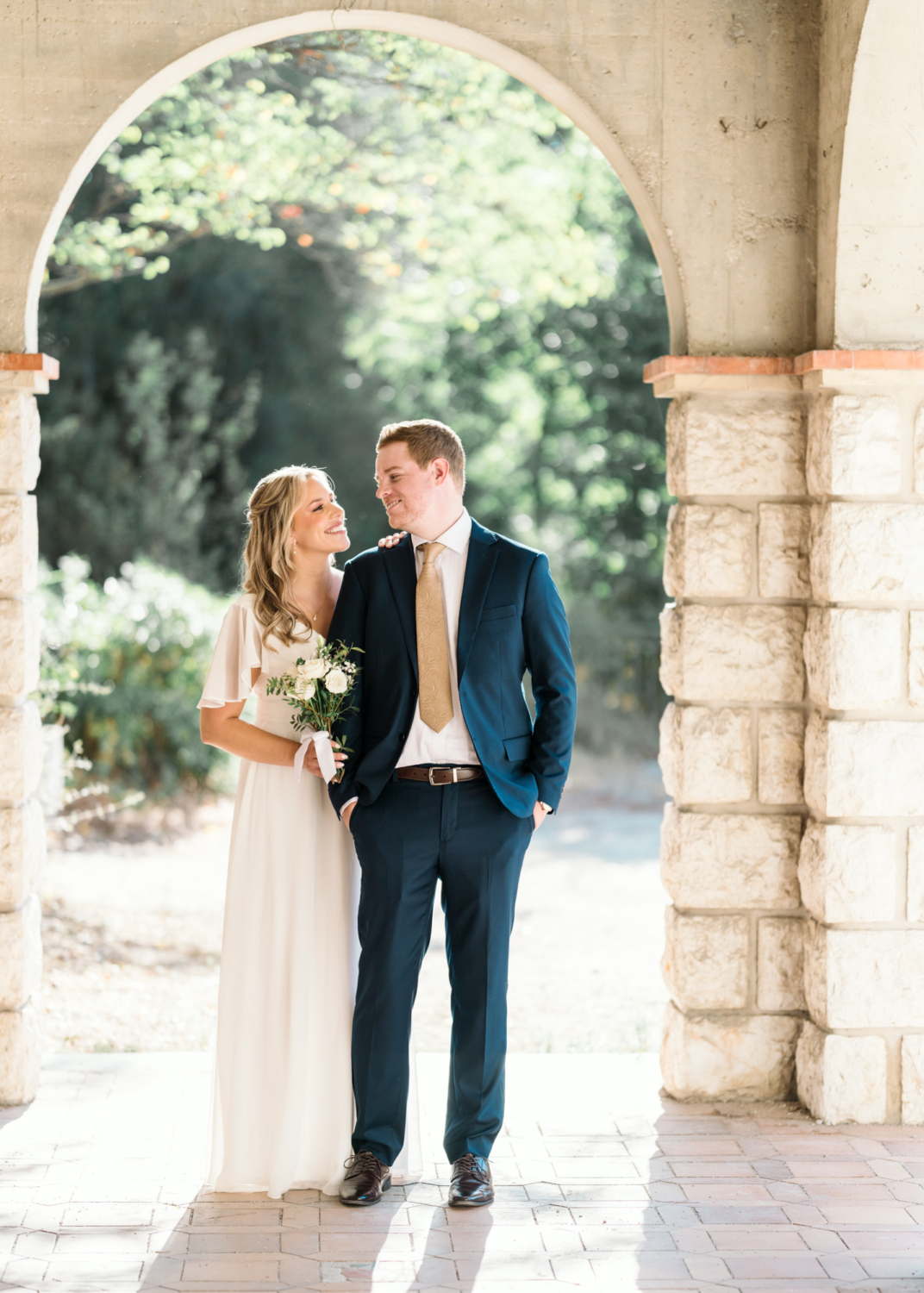 bride and groom embrace in nice france