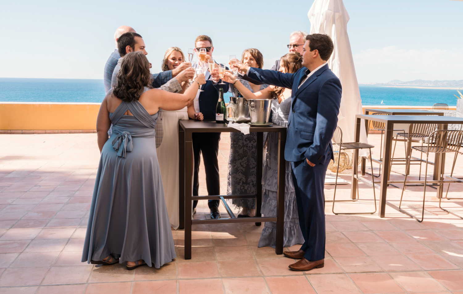 family toasts the bride and groom in nice france