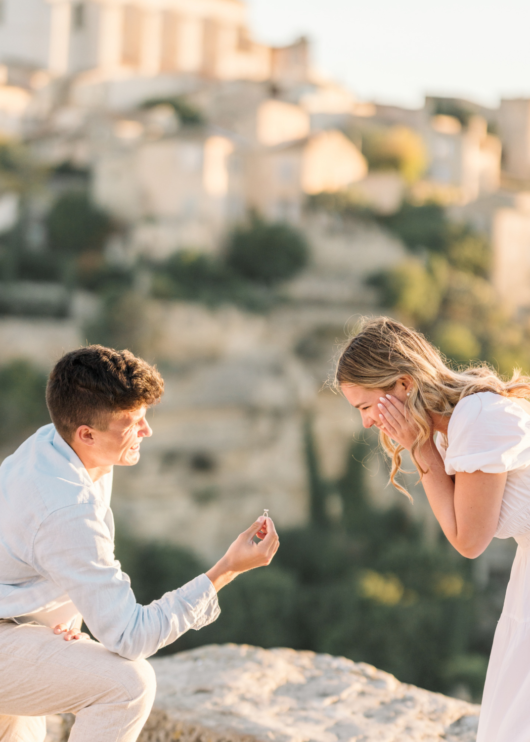 woman is shocked by her engagement ring in gordes france