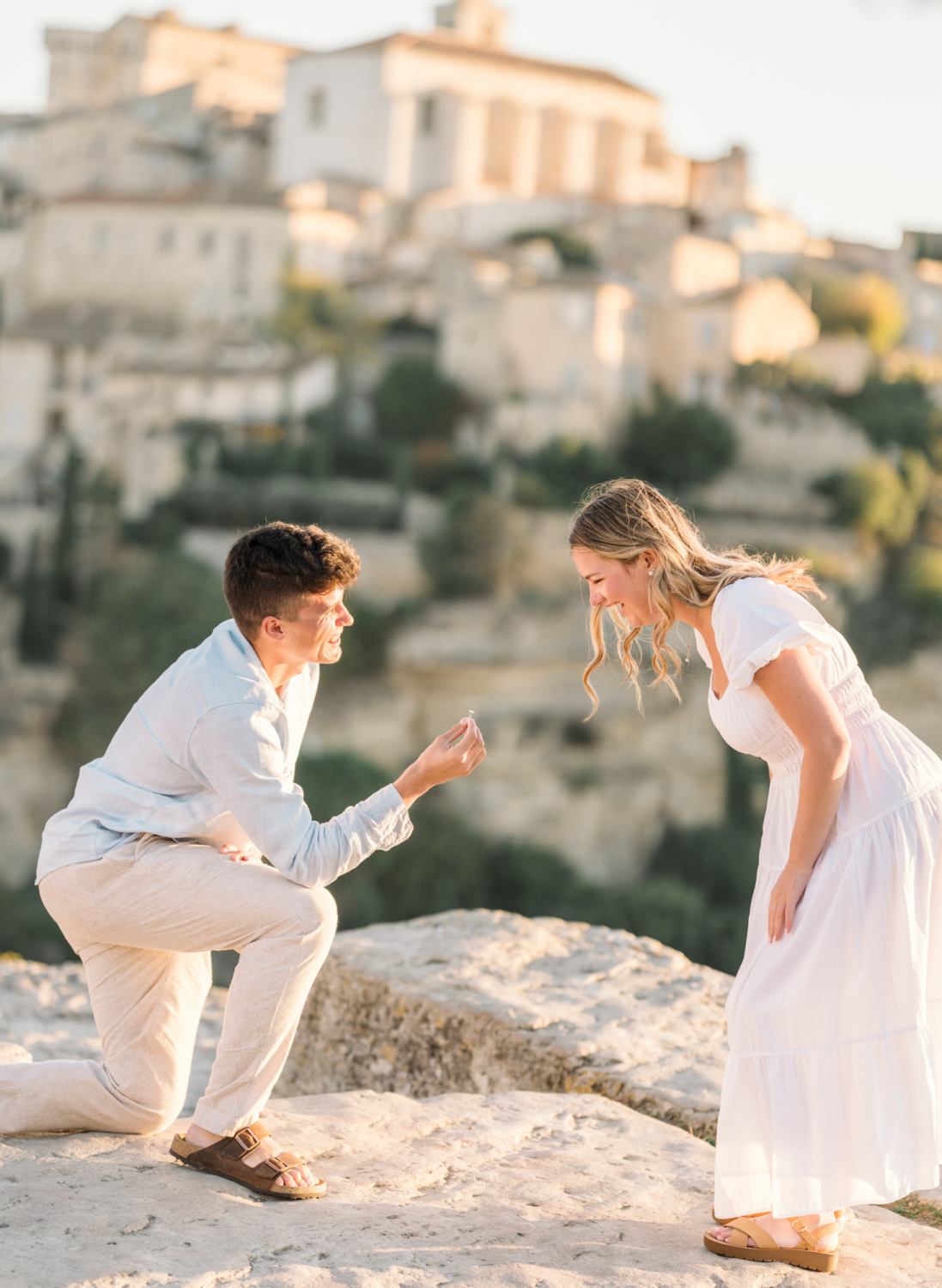 woman is delighted to see her engagement ring in gordes france