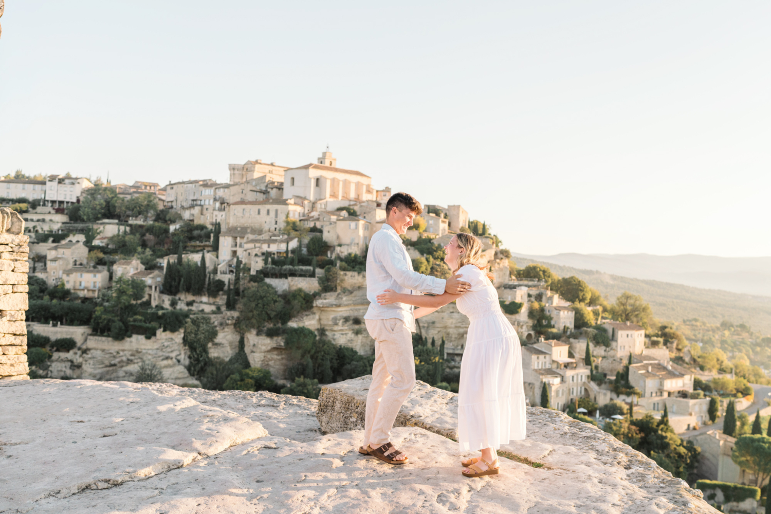 woman is shocked after surprise proposal in gordes france