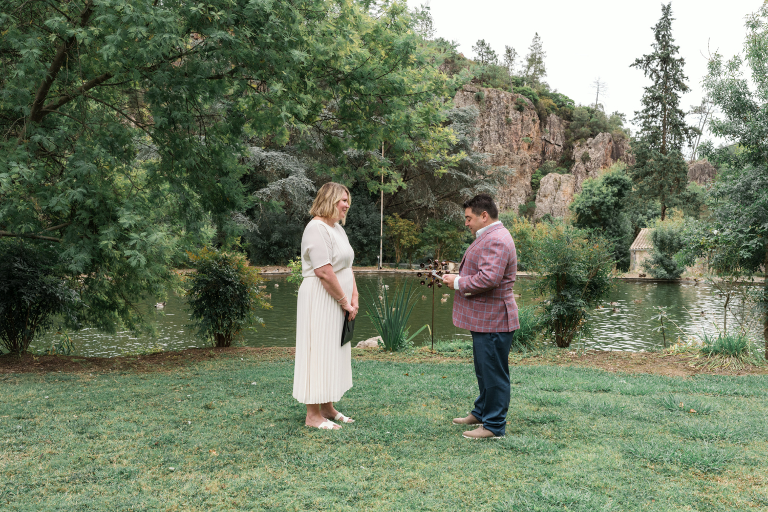 groom reads vows on his wedding day