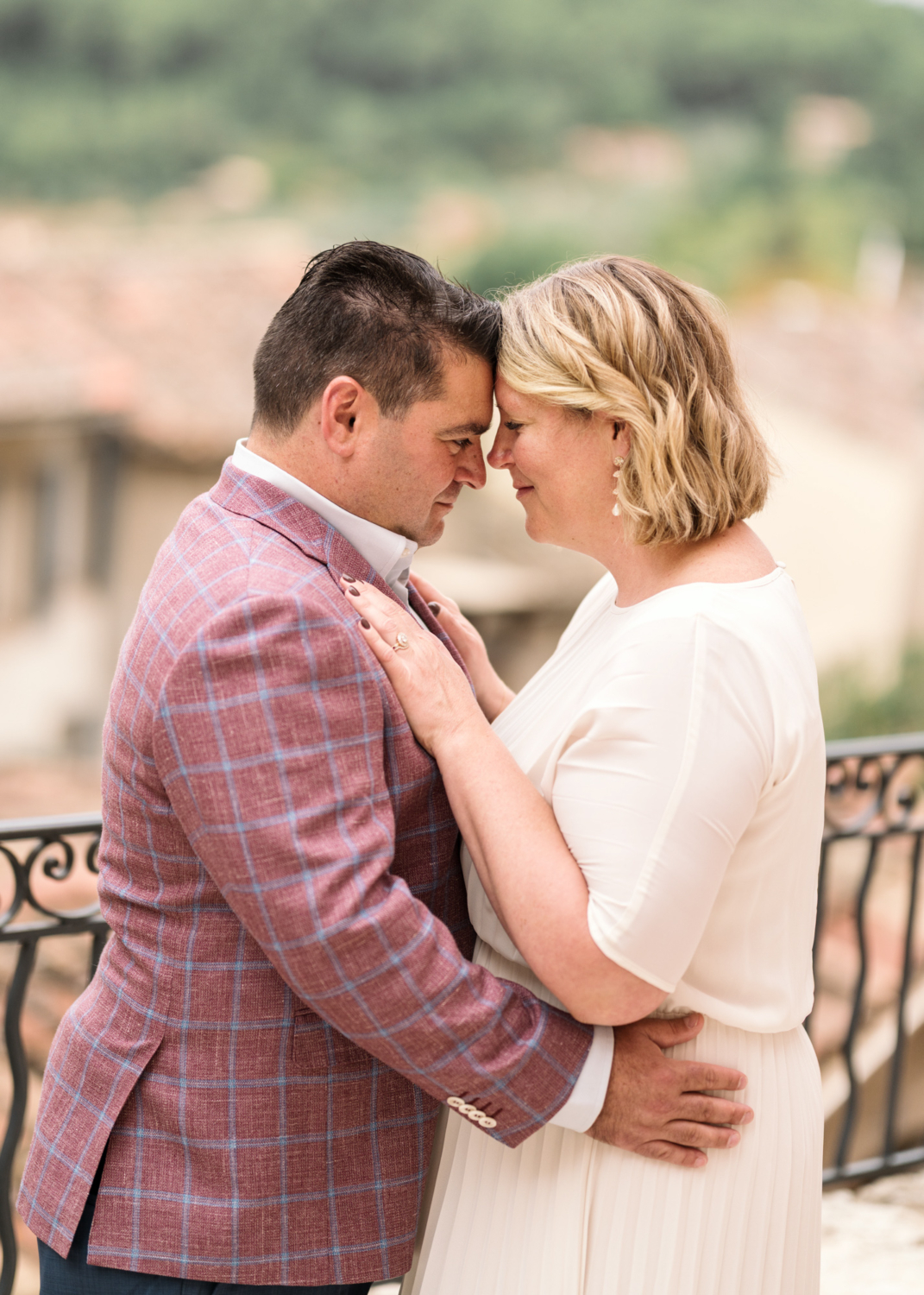 bride and groom embrace on their wedding day in callas france