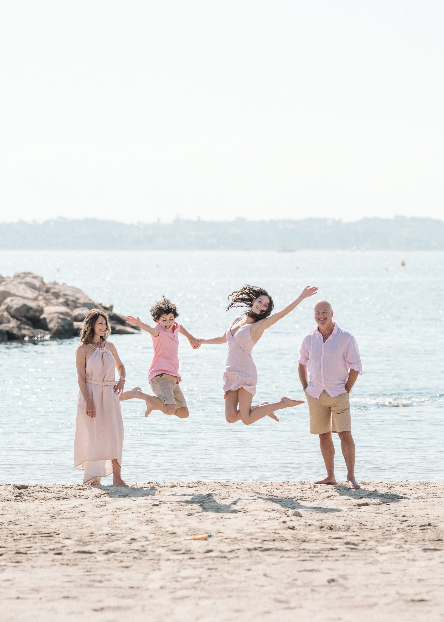 joyful family on the beach in antibes france