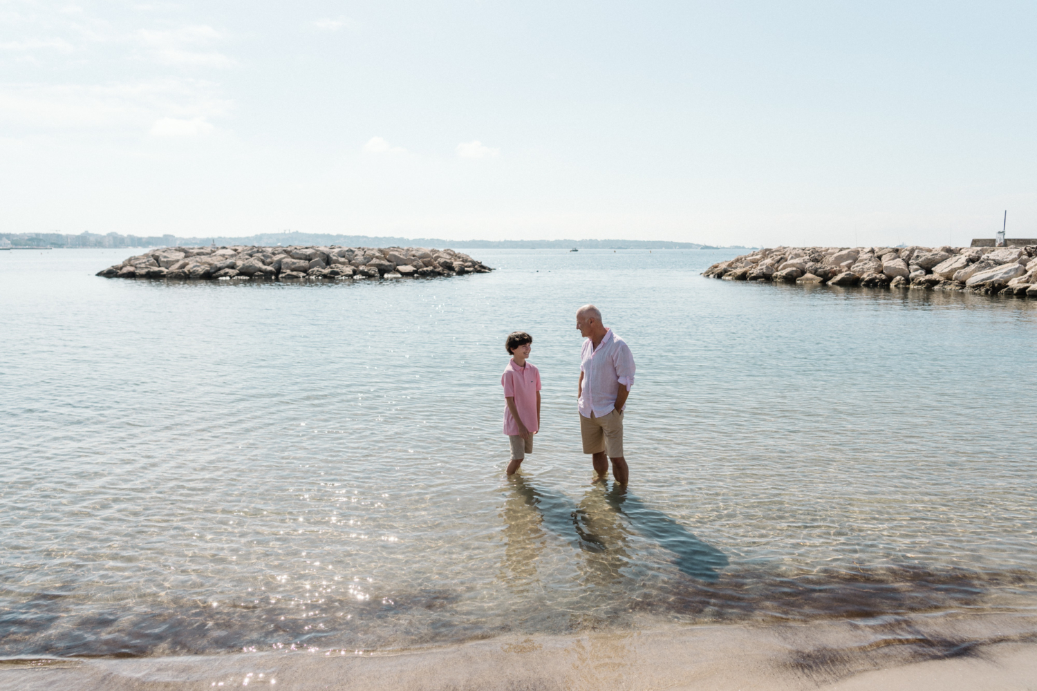 father and son in the water in antibes france