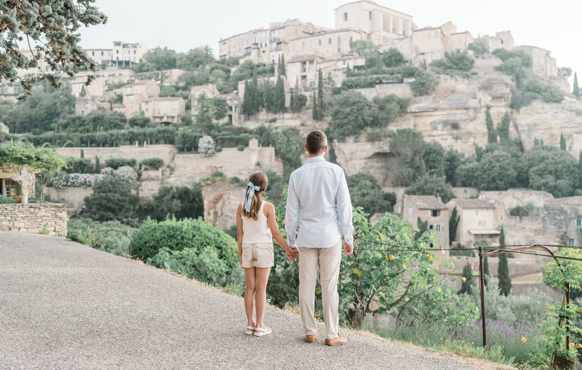 girl and her dad look at beautiful gordes france