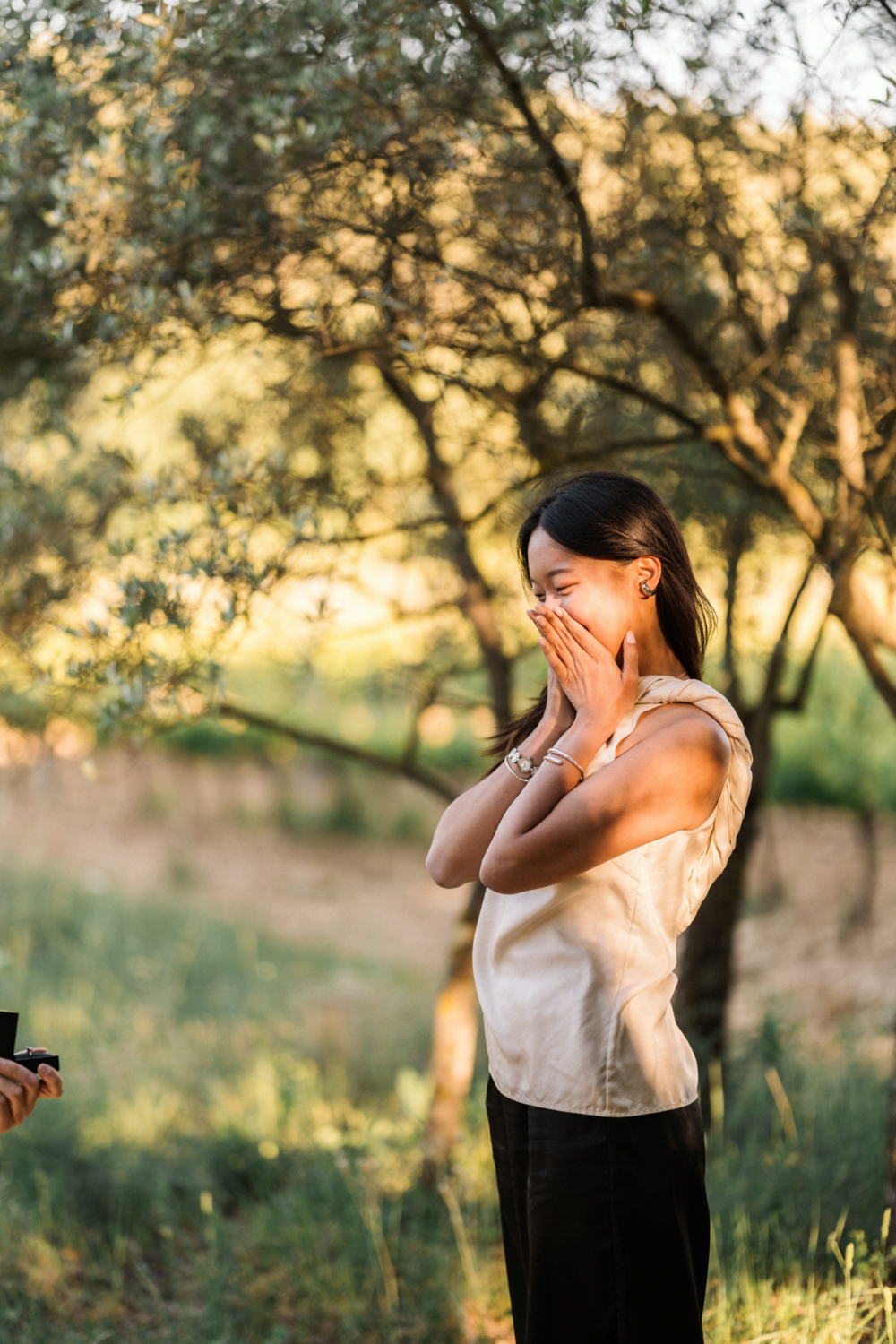 woman surprised man is proposing to her