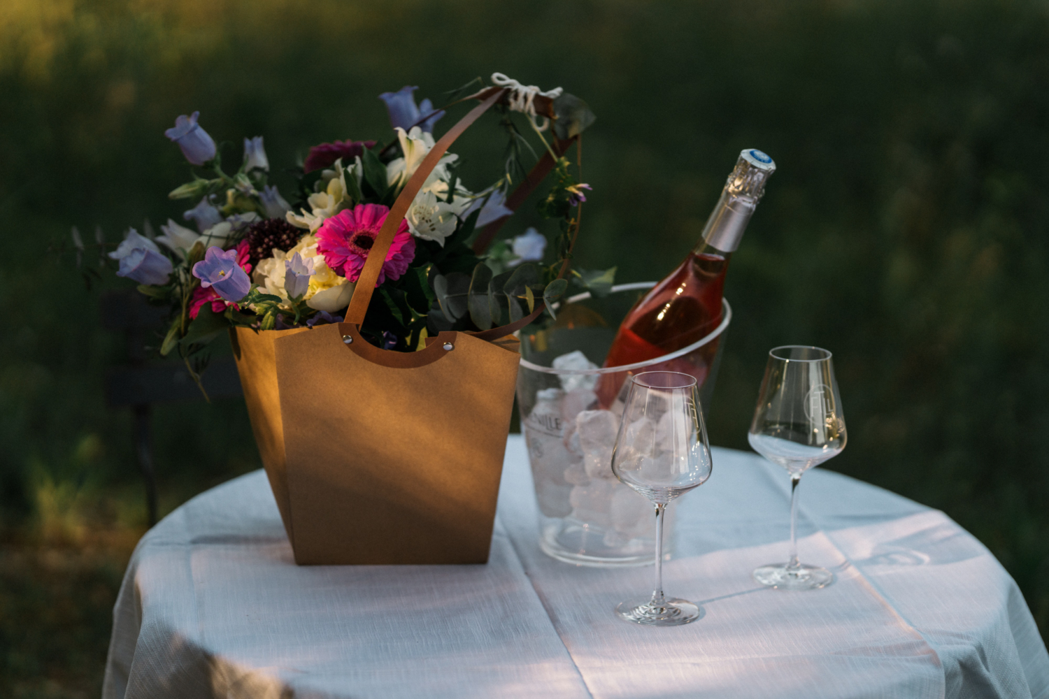 flowers and champagne on a table