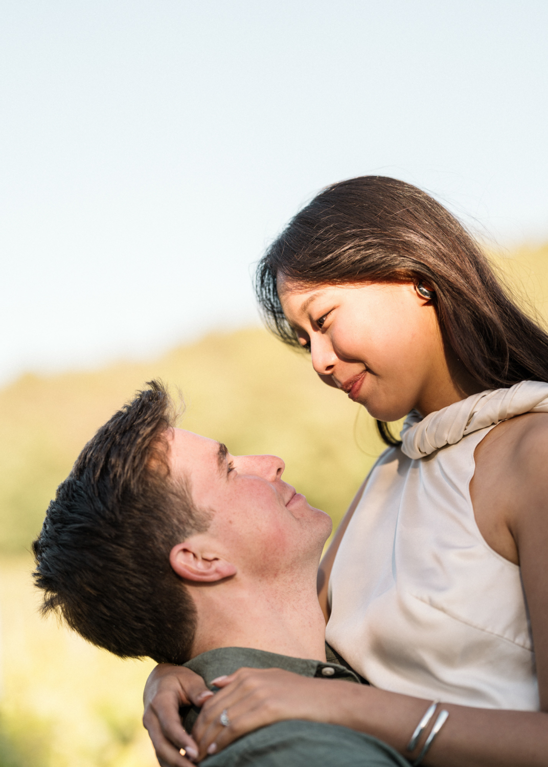 woman smiles after becoming engaged in provence
