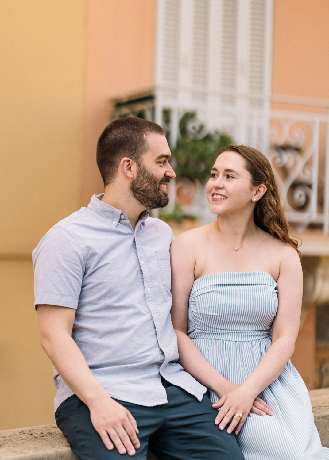 cute couple pose in old town monaco